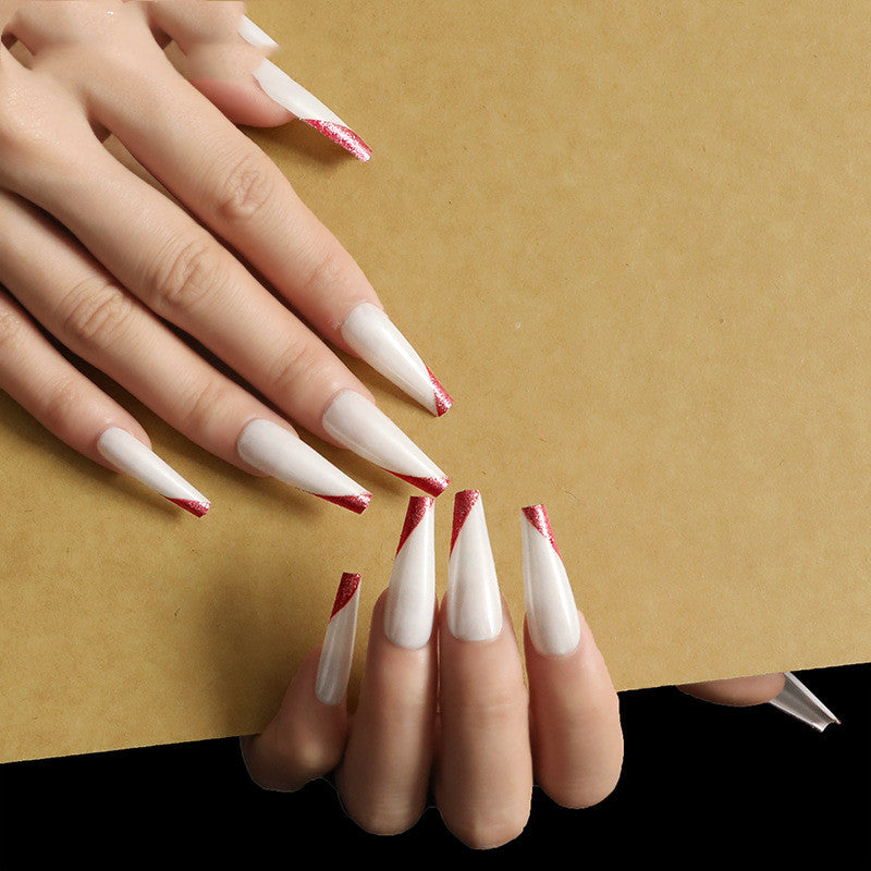 Wearing nails rose gold and beveled edge french manicure