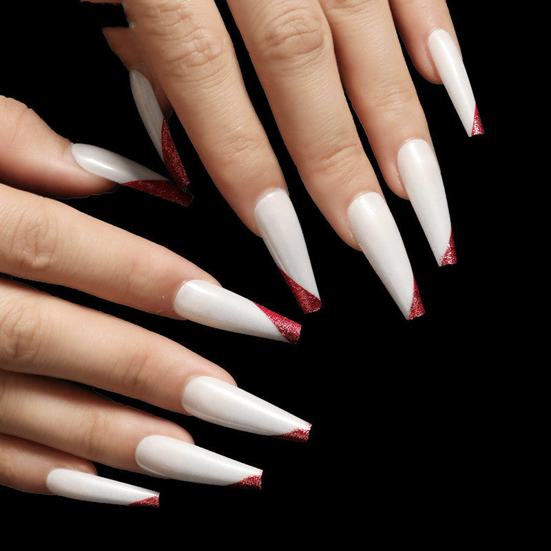 Wearing nails rose gold and beveled edge french manicure