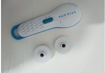 High Quality Skin Beauty Care Electric Facial Cleanser with additional attachments on a light background.