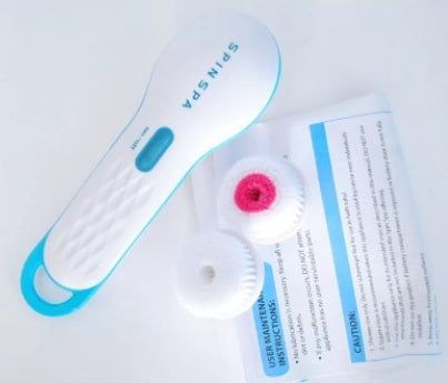 High Quality Skin Beauty Care Electric Facial Cleanser with interchangeable brush heads and user instructions.
