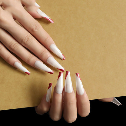 Wearing nails rose gold and beveled edge french manicure