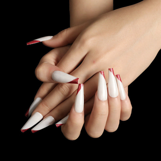 Wearing nails rose gold and beveled edge french manicure