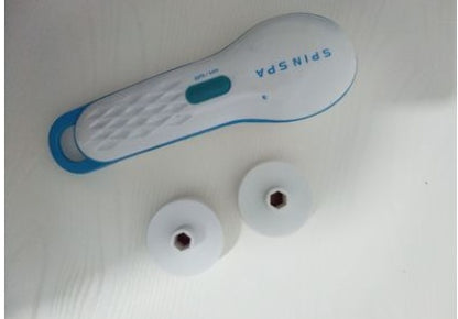 High Quality Skin Beauty Care Electric Facial Cleanser with additional attachments on a light background.