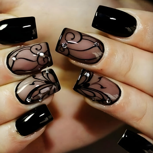 Dark Ins Style Black Vine Wearing Nails And Nails with stylish black designs and rhinestones on long nails.